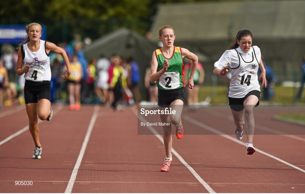 24 August 2014; Chloe Hayden, Askea, Co.Carlow, centre, with Eve Murphy, Bantry, Co.Cork, left, and Kelly Doyle, Tubbercurry, Co.Sligo, in action during the semi Final of the Girls U.14 100 metres. HSE Community Games August Festival 2014, Athlone Institute of Technology, Athlone, Co. Westmeath.  Picture credit: David Maher / SPORTSFILE