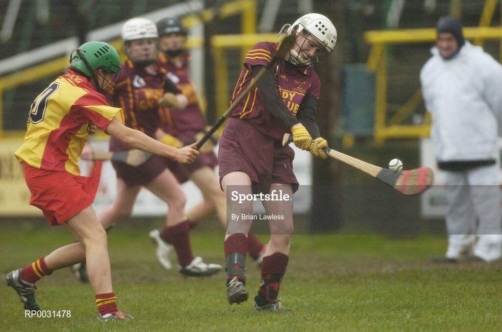 19 November 2006; Eileen McCrory, Keady, in action against Angela Hanlon, Harps. All-Ireland Junior Camogie Championship Final, Harps v Keady, O'Moore Park, Portlaoise, Co. Laois. Picture credit: Brian Lawless / SPORTSFILE
