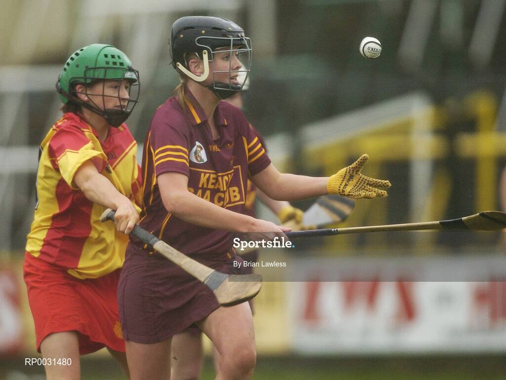 19 November 2006; Katrina Kinsella, Keady, in action against Angela Hanlon, Harps. All-Ireland Junior Camogie Championship Final, Harps v Keady, O'Moore Park, Portlaoise, Co. Laois. Picture credit: Brian Lawless / SPORTSFILE