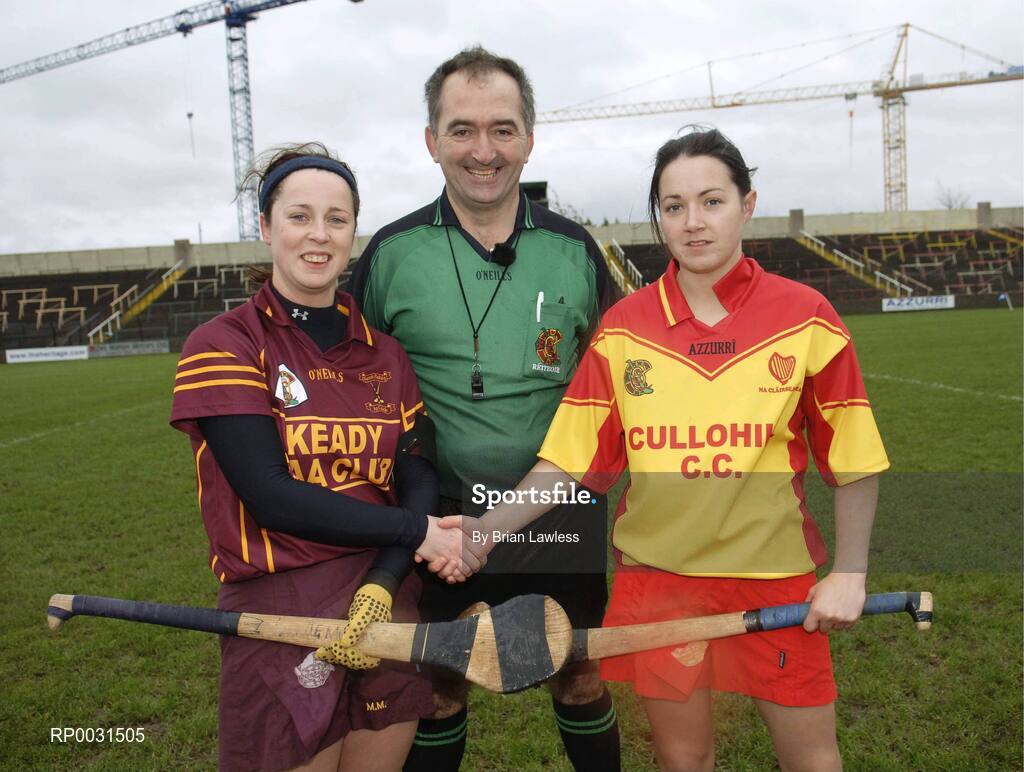 PR LIBRARY ONLY        19 November 2006; Keady captain Michelle Murray, left, and Harps captain Denise Quigley, shake hands in the company of referee Oliver Webb. All-Ireland Junior Camogie Championship Final, Harps v Keady, O'Moore Park, Portlaoise, Co. Laois. Picture credit: Brian Lawless / SPORTSFILE