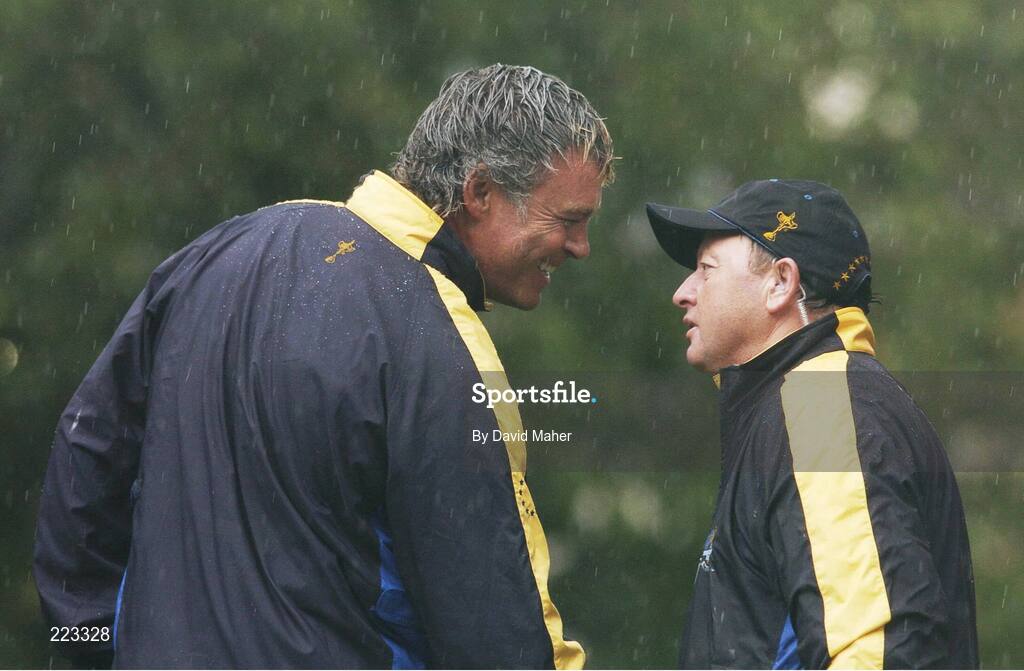 23 September 2006; Darren Clarke, Team Europe 2006, is congratulated by team captain Ian Woosnam, right, after his birdie chip on the 16th hole during Saturday morning's four-ball matches. 36th Ryder Cup Matches, K Club, Straffan, Co. Kildare, Ireland. Picture credit: David Maher / SPORTSFILE