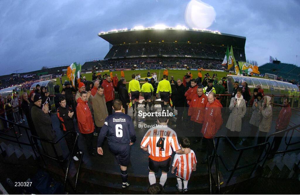 3 December 2006; St Patrick's Athletic captain Colm Foley, left, and Derry City captain Peter Hutton lead their teams out onto the pitch for the last soccer game to be played at Lansdowne Road. FAI Carlsberg Senior Challenge Cup Final, Derry City v St Patrick's Athletic, Lansdowne Road, Dublin. Picture credit: David Maher / SPORTSFILE