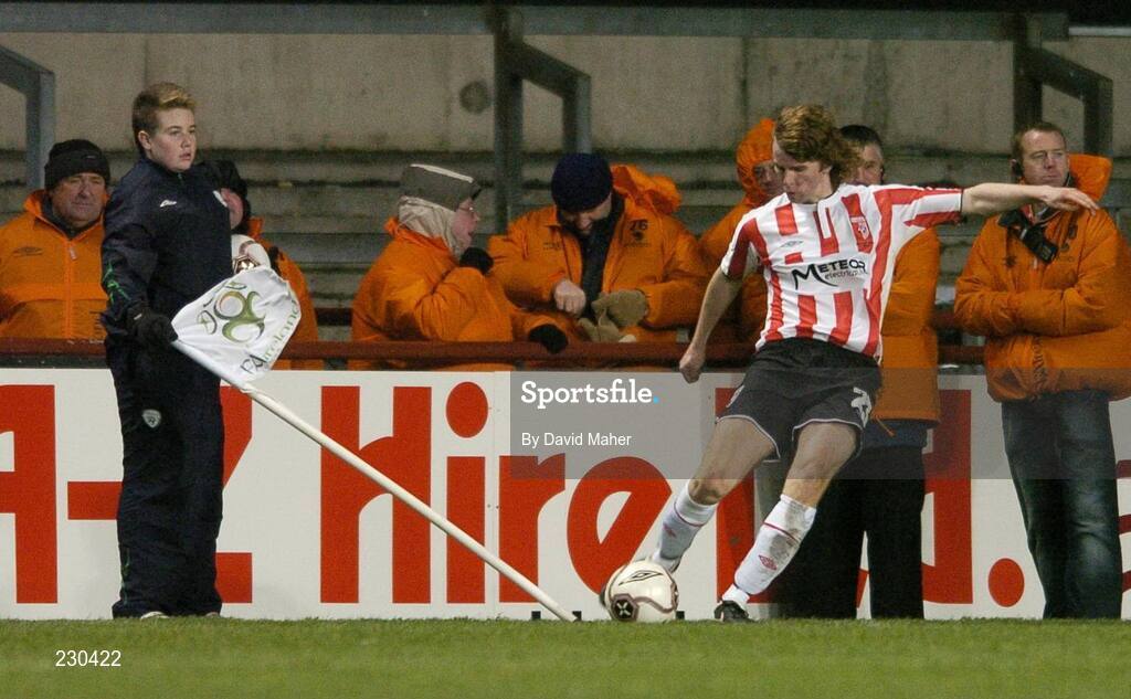 3 December 2006; A ballboy holds the corner flag as Derry City's Pat McCourt take's a corner kick. FAI Carlsberg Senior Challenge Cup Final, Derry City v St Patrick's Athletic, Lansdowne Road, Dublin. Picture credit: David Maher / SPORTSFILE