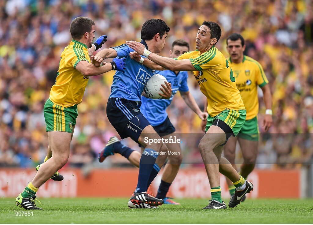 31 August 2014; Cian O'Sullivan, Dublin, in action against Paddy McGrath, left, and Rory Kavanagh, Donegal. GAA Football All Ireland Senior Championship, Semi-Final, Dublin v Donegal, Croke Park, Dublin. Picture credit: Brendan Moran / SPORTSFILE