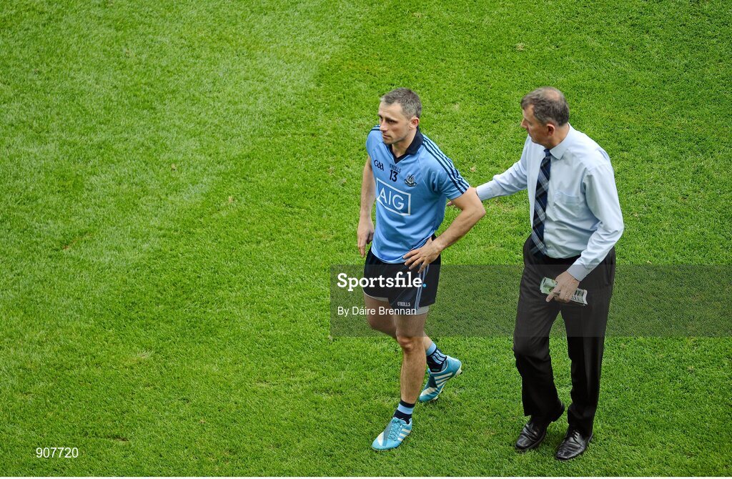 31 August 2014; Dublin County Board Secretary John Costello consoles Alan Brogan after the game. GAA Football All Ireland Senior Championship, Semi-Final, Dublin v Donegal, Croke Park, Dublin. Picture credit: Dáire Brennan / SPORTSFILE