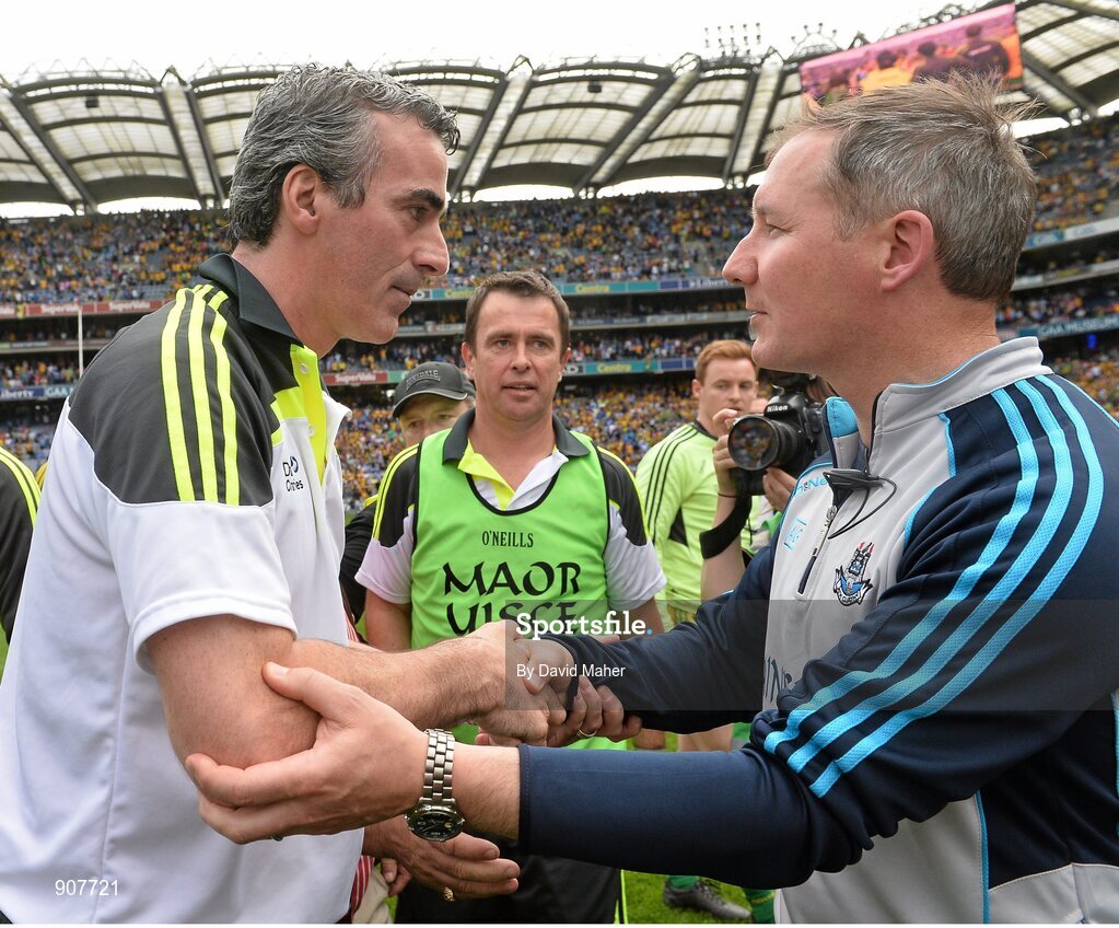 31 August 2014; Donegal manager Jim McGuinness with Dublin manager Jim Gavin at the end of the game. GAA Football All Ireland Senior Championship, Semi-Final, Dublin v Donegal, Croke Park, Dublin. Picture credit: David Maher / SPORTSFILE