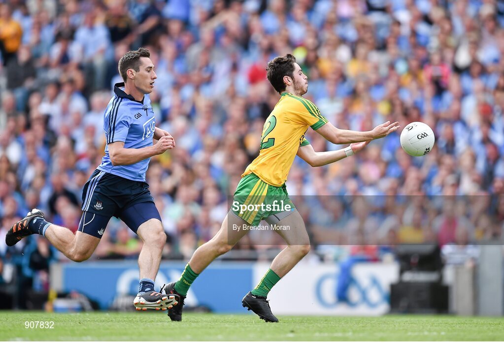 31 August 2014; Ryan McHugh, Donegal, races through the Dublin defence ahead of Nicky Devereux. GAA Football All Ireland Senior Championship, Semi-Final, Dublin v Donegal, Croke Park, Dublin. Picture credit: Brendan Moran / SPORTSFILE