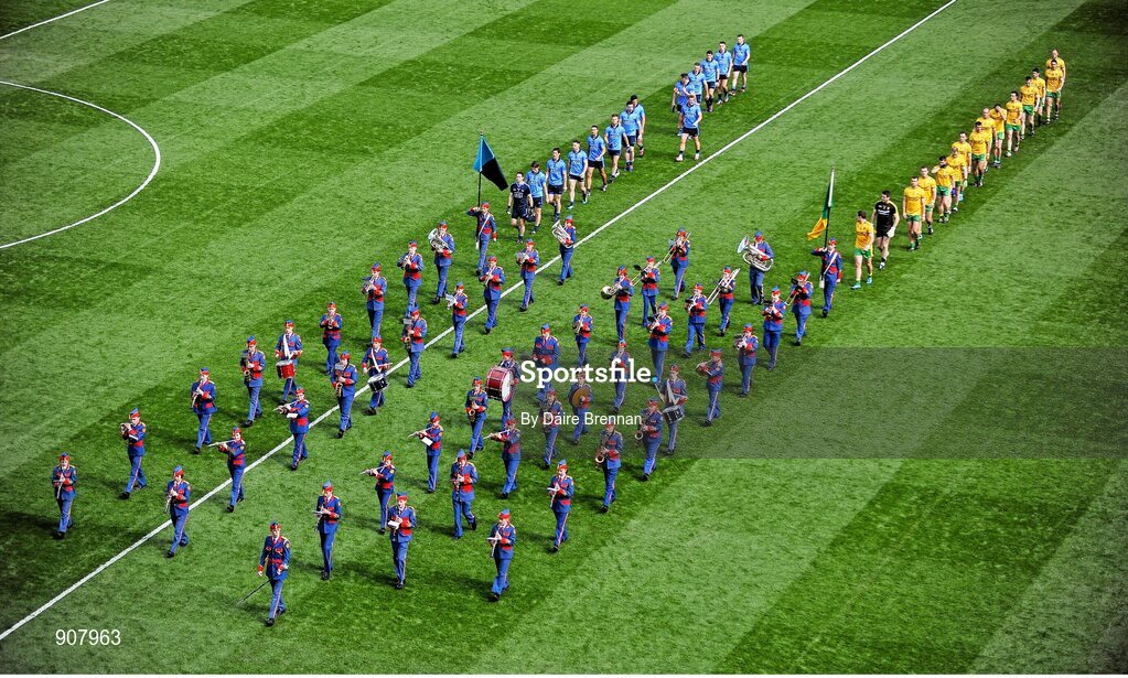 31 August 2014; The Dublin and Donegal teams parade behind the Artane School of Music Band before the game. GAA Football All Ireland Senior Championship, Semi-Final, Dublin v Donegal, Croke Park, Dublin. Picture credit: Dáire Brennan / SPORTSFILE