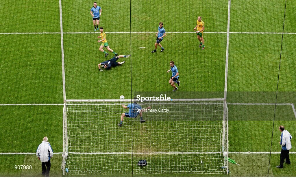 31 August 2014; Ryan McHugh, Donegal, scores his side's first goal past Dublin goalkeeper Stephen Cluxton. GAA Football All Ireland Senior Championship, Semi-Final, Dublin v Donegal, Croke Park, Dublin. Picture credit: Ramsey Cardy / SPORTSFILE