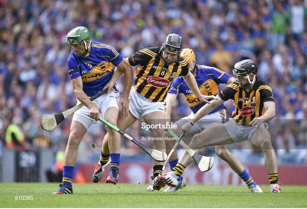 7 September 2014; James Woodlock and Shane McGrath, Tipperary, contest the first throw in with Richie Hogan and Conor Fogarty, Kilkenny. GAA Hurling All Ireland Senior Championship Final, Kilkenny v Tipperary. Croke Park, Dublin. Picture credit: Brendan Moran / SPORTSFILE