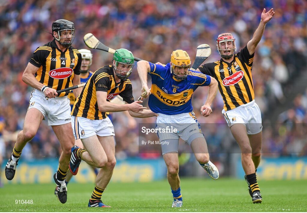 7 September 2014; Shane McGrath, Tipperary, in action against Kilkenny players from left, Jackie Tyrrell, Joey Holden and Cillian Buckley. GAA Hurling All Ireland Senior Championship Final, Kilkenny v Tipperary. Croke Park, Dublin. Picture credit: Pat Murphy / SPORTSFILE