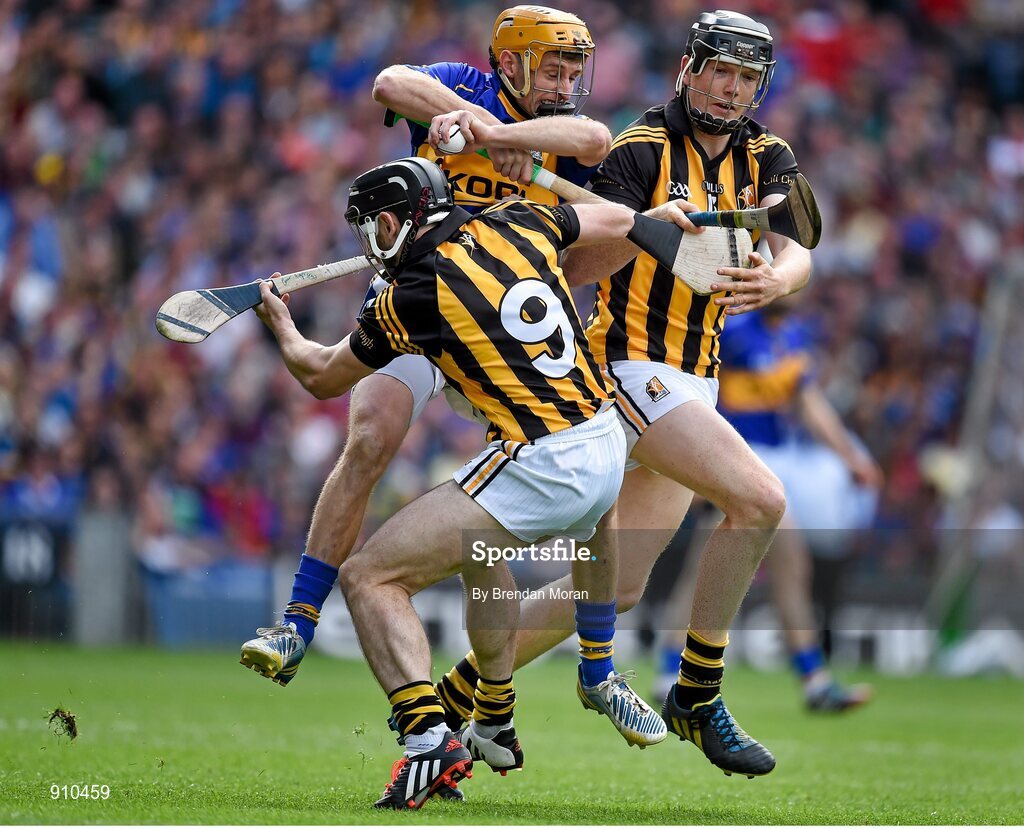 7 September 2014; Shane McGrath, Tipperary, in action against Conor Fogarty, 9, and Walter Walsh, Kilkenny. GAA Hurling All Ireland Senior Championship Final, Kilkenny v Tipperary. Croke Park, Dublin. Picture credit: Brendan Moran / SPORTSFILE