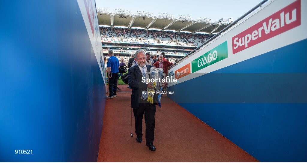 7 September 2014; Croke Park public adddress anouncer Jerry Grogan removes the Liam MacCarthy Cup to safe keeping after the game. GAA Hurling All Ireland Senior Championship Final, Kilkenny v Tipperary. Croke Park, Dublin. Picture credit: Ray McManus / SPORTSFILE
