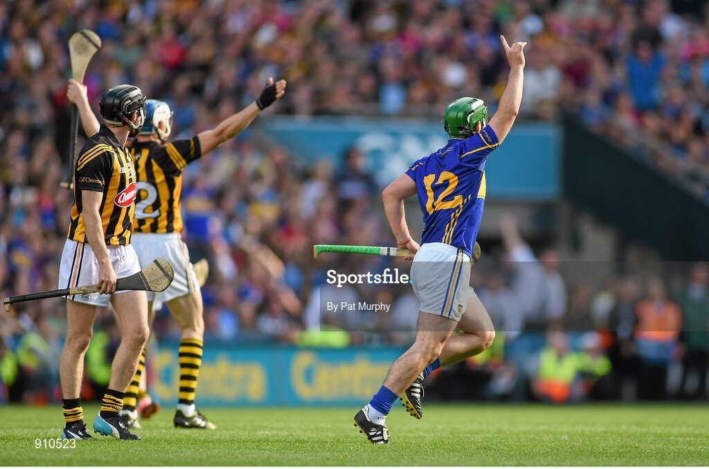 7 September 2014; John O'Dwyer, Tipperary, celebrates after hitting a last minute free while Kilkenny players Aidan Fogarty, left, and TJ Reid look on. After consulting Hawkeye the free was adjudged to be wide and the game ended in a draw. GAA Hurling All Ireland Senior Championship Final, Kilkenny v Tipperary. Croke Park, Dublin. Picture credit: Pat Murphy / SPORTSFILE