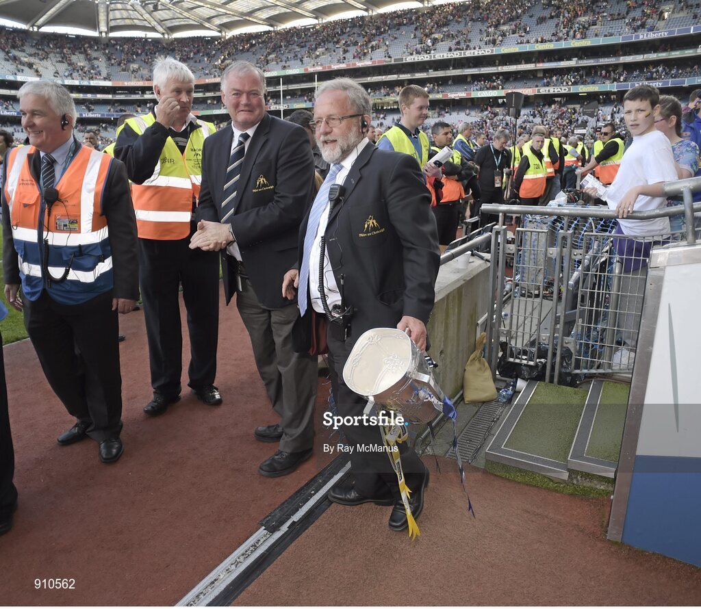 7 September 2014; Croke Park public address anouncer Jerry Grogan removes the Liam MacCarthy Cup for safe keeping after the game. GAA Hurling All Ireland Senior Championship Final, Kilkenny v Tipperary. Croke Park, Dublin. Picture credit: Ray McManus / SPORTSFILE