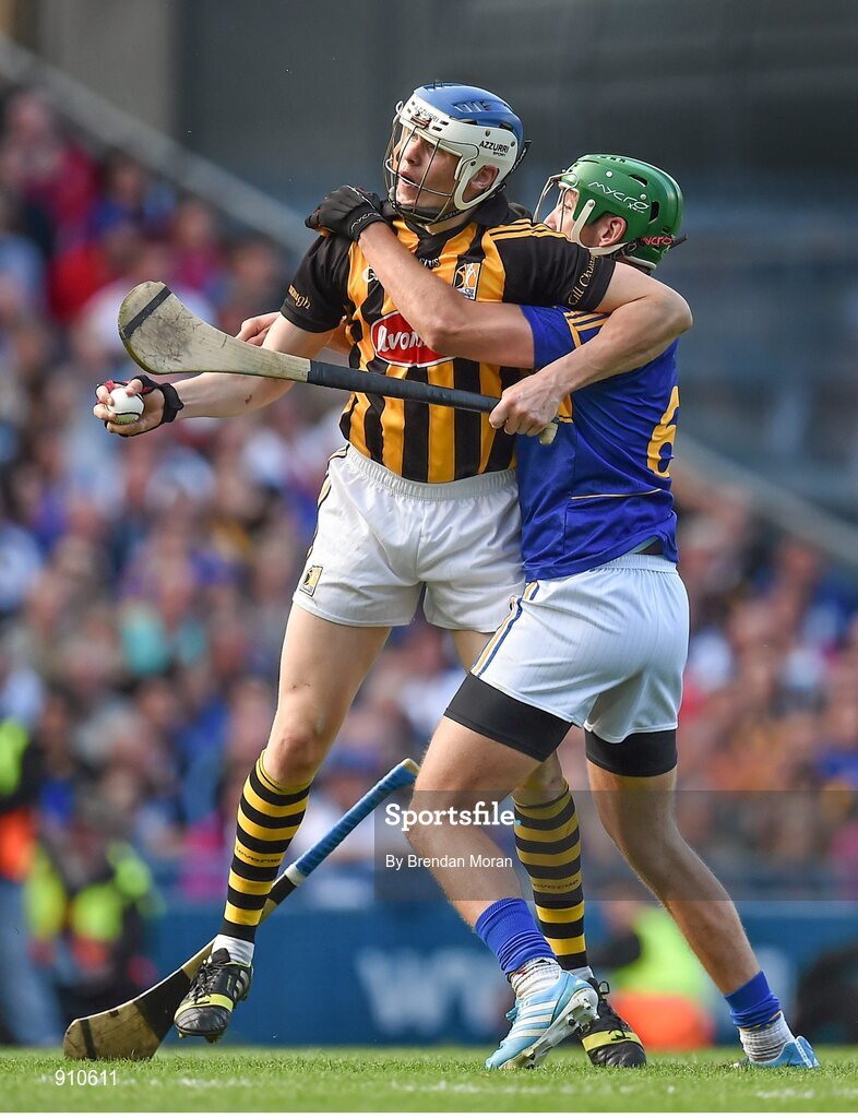 7 September 2014; TJ Reid, Kilkenny, holds off the tackle of James Barry, Tipperary. GAA Hurling All Ireland Senior Championship Final, Kilkenny v Tipperary. Croke Park, Dublin. Picture credit: Brendan Moran / SPORTSFILE