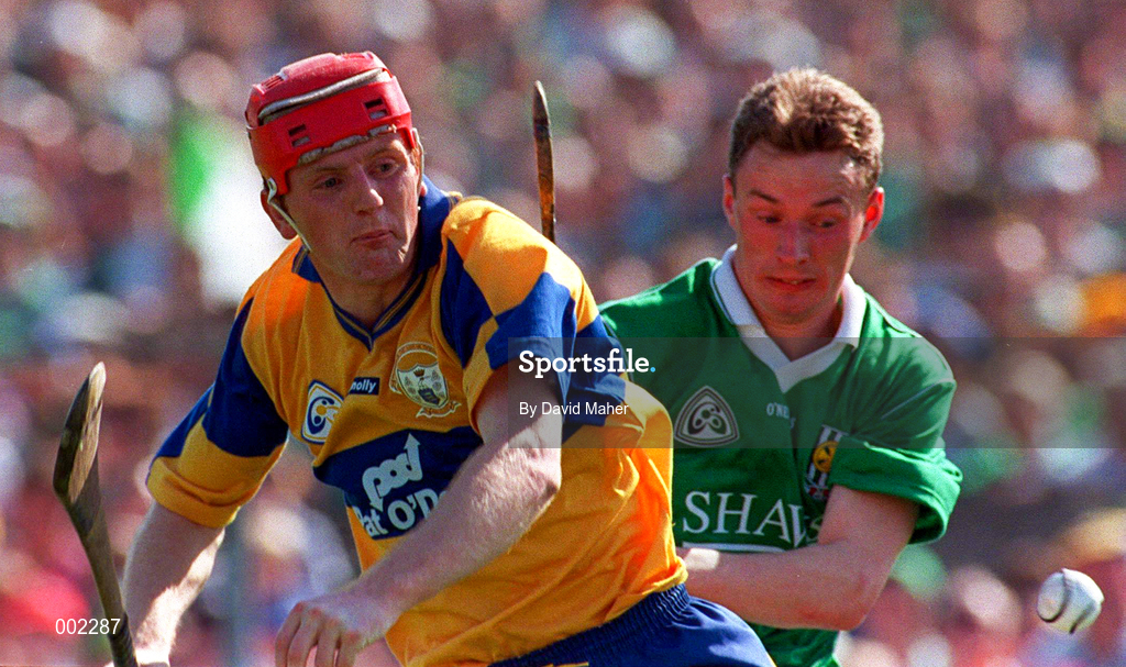 16 June 1996; Brian Lohan of Clare in action against Owen O'Neill of Limerick during the Munster GAA Hurling Senior Championship Semi-Final match between Limerick and Clare at Gaelic Grounds in Limerick. Photo by David Maher/Sportsfile