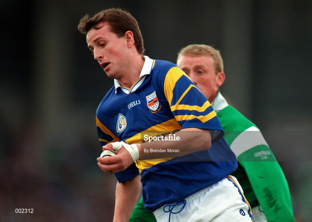 13 April 1997; Brian O'Meara of Tipperary in action against Dave Clarke of Limerick during the National Hurling League Division 1 match between Limerick v Tipperary at the Gaelic Grounds in Limerick. Photo by Brendan Moran/Sportsfile