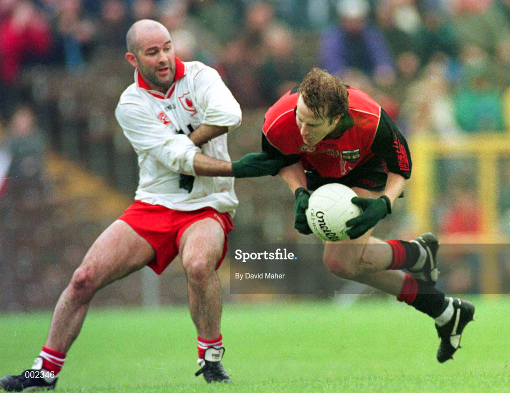 18 May 1997; Ciaran McCabe of Down in action against Paul Donnelly of Tyrone during the Ulster GAA Football Senior Championship Preliminary Round match between Down and Tyrone at St. Tiernach's Park in Clones. Photo by David Maher/Sportsfile