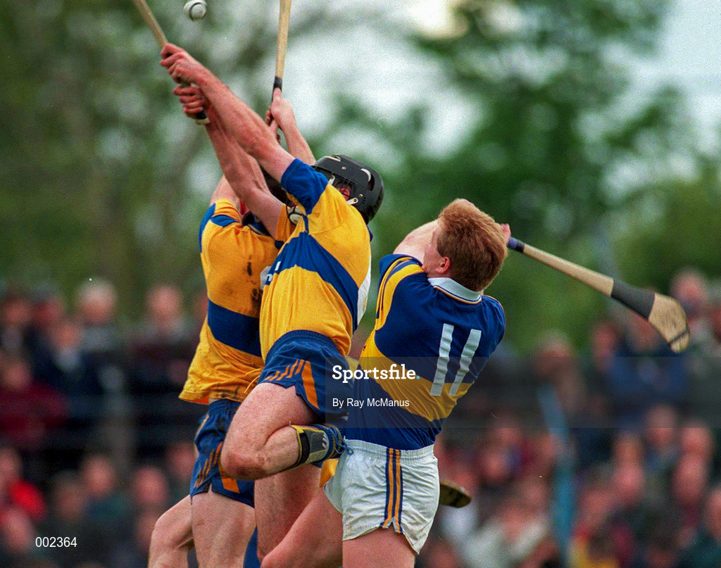 10 May 1997; Players of both teams contest for possession during the National Hurling League Division 1 match between Clare and Tipperary at Cusack Park in Ennis. Photo by Ray McManus/Sportsfile