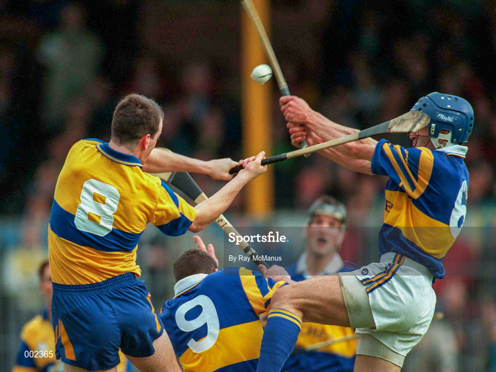 10 May 1997; Ollie Baker, 8, of Clare battles for possession against Colm Bonner of Tipperary during the National Hurling League Division 1 match between Clare and Tipperary at Cusack Park in Ennis. Photo by Ray McManus/Sportsfile