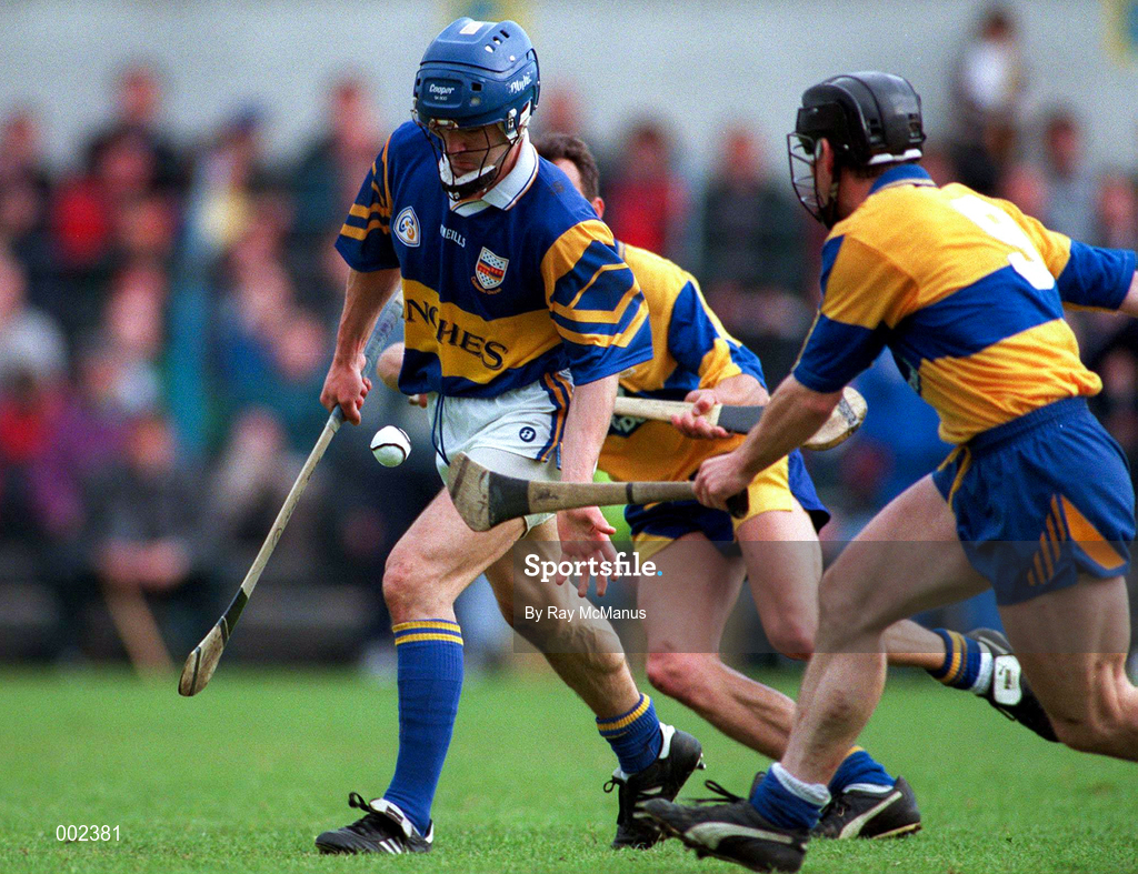 10 May 1997; Colm Bonner of Tipperary in action against Anthony Daly, behind, and David Forde of Clare during the National Hurling League Division 1 match between Clare and Tipperary at Cusack Park in Ennis. Photo by Ray McManus/Sportsfile