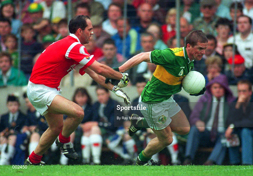 21 July 1996; Dara O'Cinneide of Kerry in action against Mark O'Connor of Cork during the Munster Senior Football Championship Final between Cork and Kerry at Pairc Ui Chaoimh, Cork. Photo by Ray McManus/Sportsfile