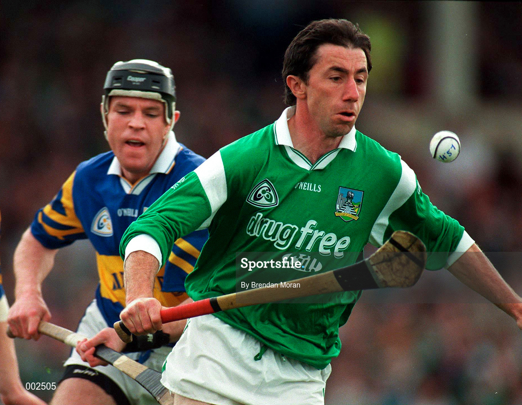 13 April 1997; Declan Nash of Limerick in action against Liam Cahill of Tipperary during the National Hurling League Division 1 match between Limerick v Tipperary at the Gaelic Grounds in Limerick. Photo by Brendan Moran/Sportsfile