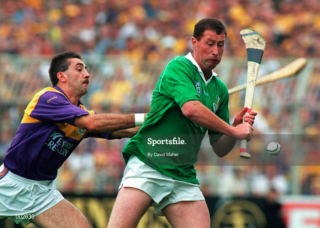 1 September 1996; Frankie Carroll of Limerick in action against Martin Storey of Wexford during the GAA All-Ireland Senior Hurling Championship Final between Wexford and Limerick at Croke Park in Dublin. Photo by David Maher/Sportsfile