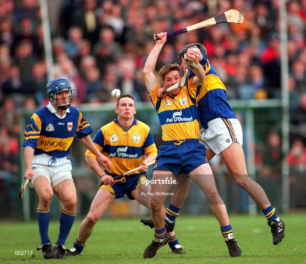 10 May 1997; James O'Connor of Clare in action against Brendan Carroll of Tipperary during the National Hurling League Division 1 match between Clare and Tipperary at Cusack Park in Ennis. Photo by Ray McManus/Sportsfile