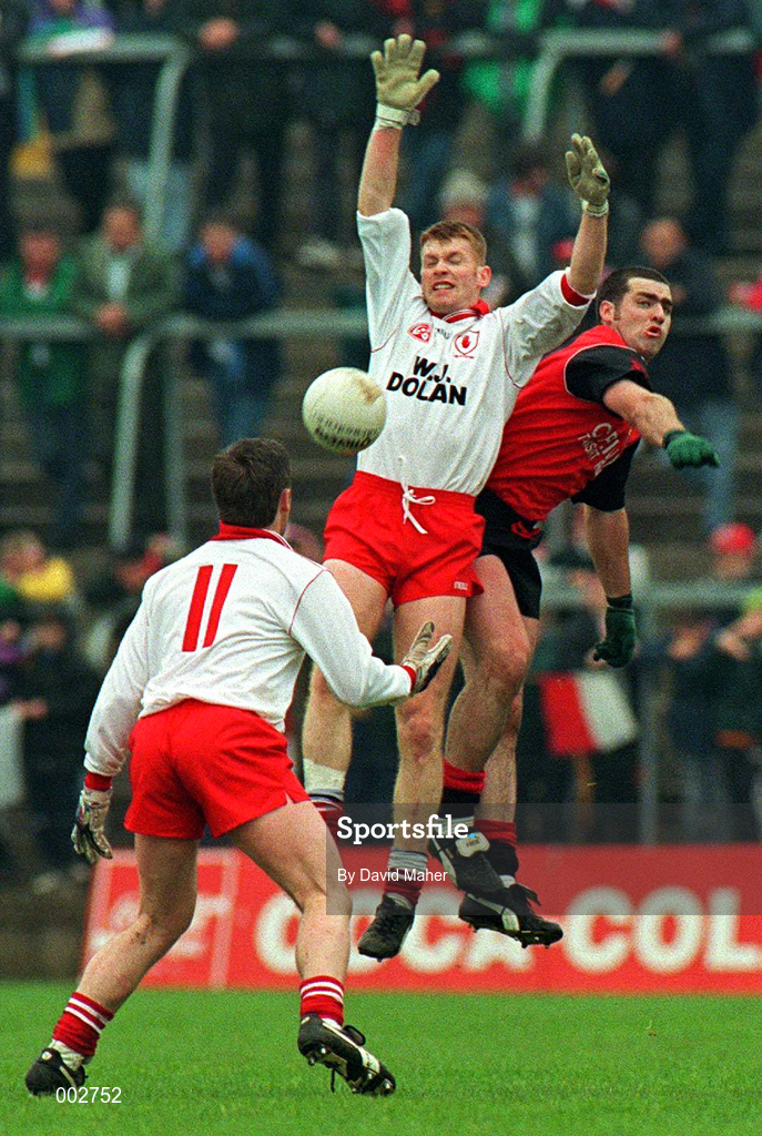 18 May 1997; Jody Gormley of Tyrone in action against Gregory McCartan of Down during the Ulster GAA Football Senior Championship Preliminary Round match between Down and Tyrone at St. Tiernach's Park in Clones. Photo by David Maher/Sportsfile