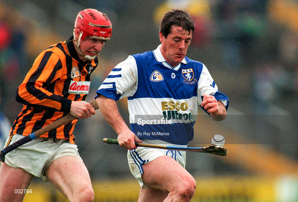 14 April 1996; Joe Dollard of Laois races clear from Michael Phelan of Kilkenny during the National Hurling League Division 1 Quarter-Final between Laois and Kilkenny at Semple Stadium in Thurles. Photo by Ray McManus/Sportsfile