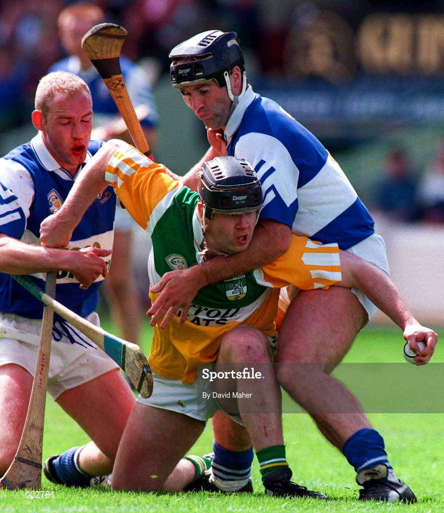 8 June 1997; Joe Errity of Offaly in action against Declan Conroy and Cyril Duggan of Laois during the GAA Leinster Senior Hurling Championship Quarter-Final between Offaly and Laois in Croke Park in Dublin. Photo by David Maher/Sportsfile