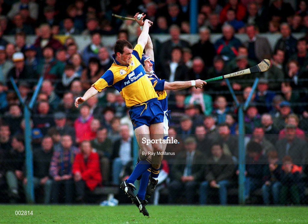 10 May 1997; John Leahy of Tipperary in action against Ollie Baker of Clare during the National Hurling League Division 1 match between Clare and Tipperary at Cusack Park in Ennis. Photo by Ray McManus/Sportsfile