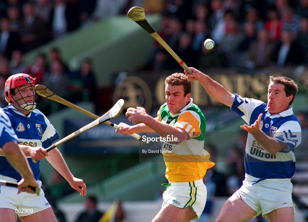 8 June 1997; Kevin Martin of Offaly in action against Niall Rigney, right, of Laois during the GAA Leinster Senior Hurling Championship Quarter-Final between Offaly and Laois in Croke Park in Dublin. Photo by David Maher/Sportsfile