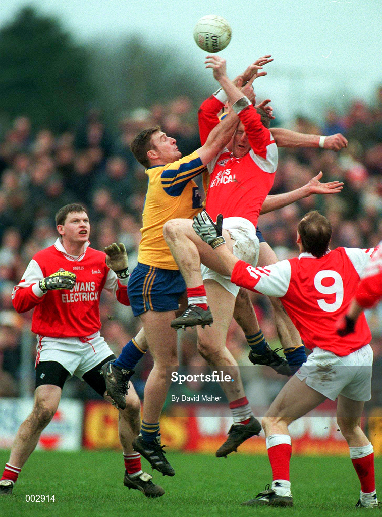 23 February 1997; Kevin Staunton of Knockmore contests a high-ball against Garvan Ware of Éire Óg during the All-Ireland Senior Club Football Championship Semi-Final between Knockmore and Éire Óg at Fr. O'Hara Memorial Park in Charlestown, Co Mayo. Photo by David Maher/Sportsfile
