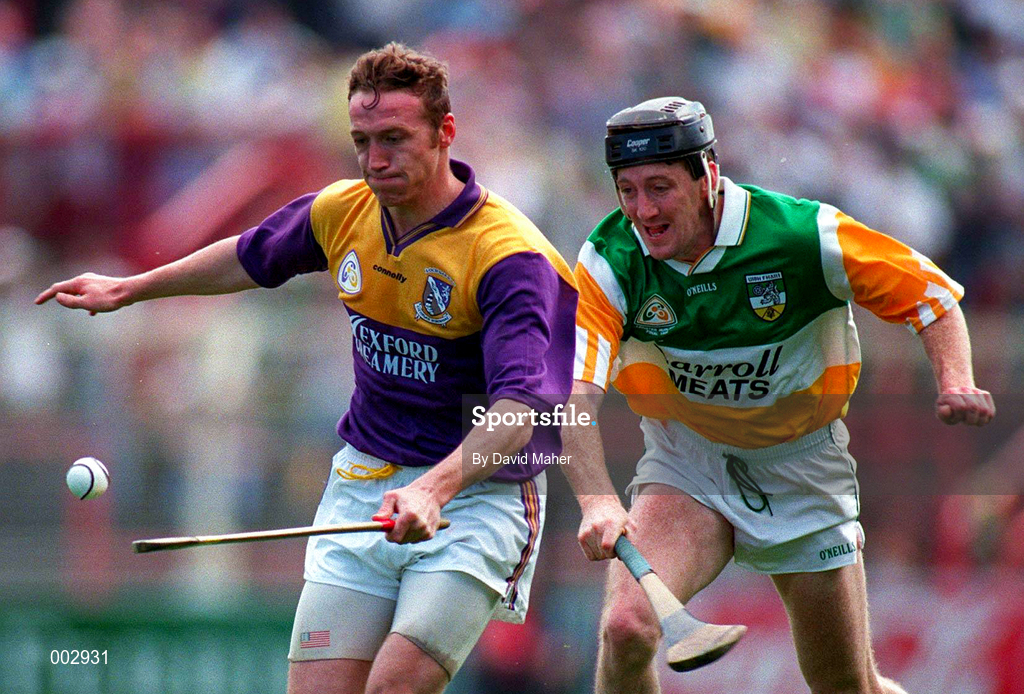 14 July 1996; Larry Murphy of Wexford gets away from Brian Whelahan of Offaly during the GAA Leinster Senior Hurling Championship Final between Wexford and Offaly at Croke Park in Dublin. Photo by David Maher/Sportsfile