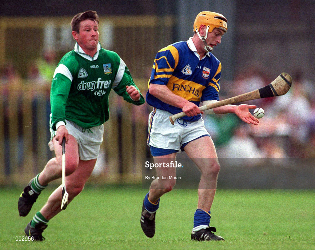 13 April 1997; Liam Cahill of Tipperary in action against Mike Houlihan of Limerick during the National Hurling League Division 1 match between Limerick v Tipperary at the Gaelic Grounds in Limerick. Photo by Brendan Moran/Sportsfile