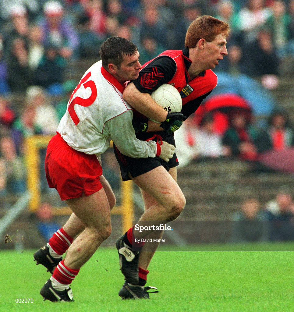 18 May 1997; Liam Howlett of Down in action against Ciaran Loughran of Tyrone during the Ulster GAA Football Senior Championship Preliminary Round match between Down and Tyrone at St. Tiernach's Park in Clones. Photo by David Maher/Sportsfile