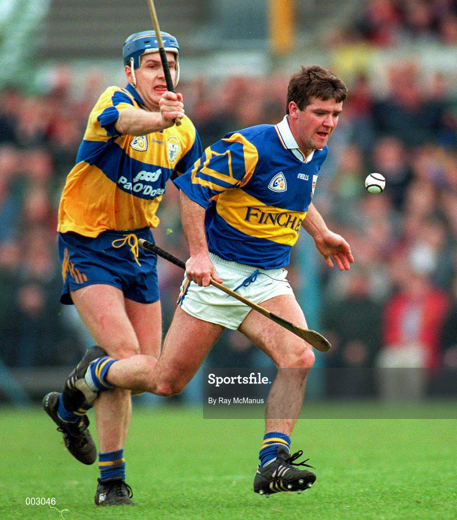 10 May 1997; Michael Cleary of Tipperary in action against Liam Doyle of Clare during the National Hurling League Division 1 match between Clare and Tipperary at Cusack Park in Ennis. Photo by Ray McManus/Sportsfile