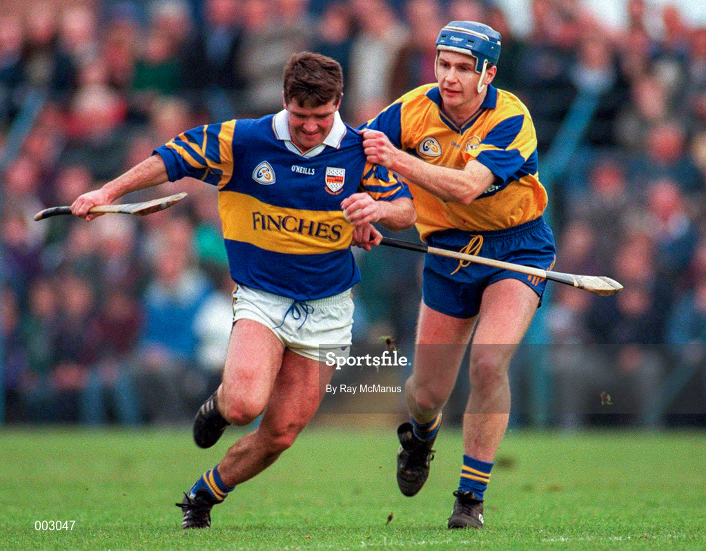 10 May 1997; Michael Cleary of Tipperary in action against Liam Doyle of Clare during the National Hurling League Division 1 match between Clare and Tipperary at Cusack Park in Ennis. Photo by Ray McManus/Sportsfile