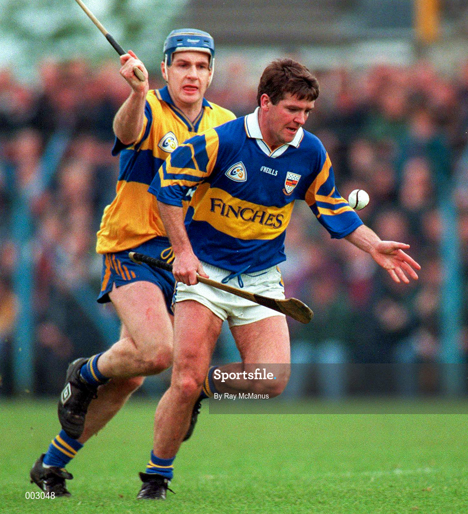 10 May 1997; Michael Cleary of Tipperary in action against Liam Doyle of Clare during the National Hurling League Division 1 match between Clare and Tipperary at Cusack Park in Ennis. Photo by Ray McManus/Sportsfile
