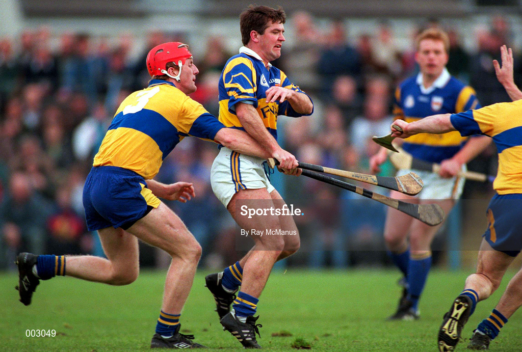 10 May 1997; Michael Cleary of Tipperary in action against Brian Lohan of Clare during the National Hurling League Division 1 match between Clare and Tipperary at Cusack Park in Ennis. Photo by Ray McManus/Sportsfile