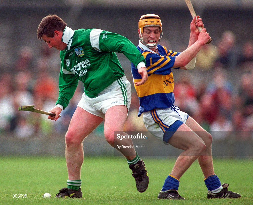 13 April 1997; Mike Houlihan of Limerick in action against Liam Cahill of Tipperary during the National Hurling League Division 1 match between Limerick v Tipperary at the Gaelic Grounds in Limerick. Photo by Brendan Moran/Sportsfile