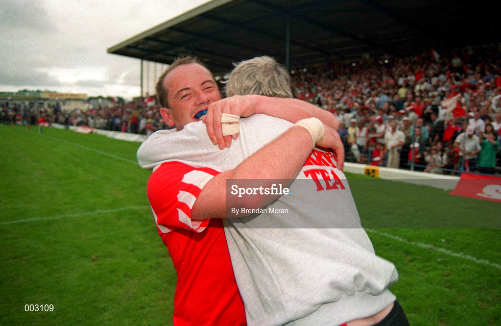 23 July 1995; Cork captain Niall Cahalane celebrates with manager Billy Morgan following the Munster Senior Football Championship Final between Kerry and Cork at Fitzgerald Stadium in Killarney, Co. Kerry. Photo by Brendan Moran/Sportsfile