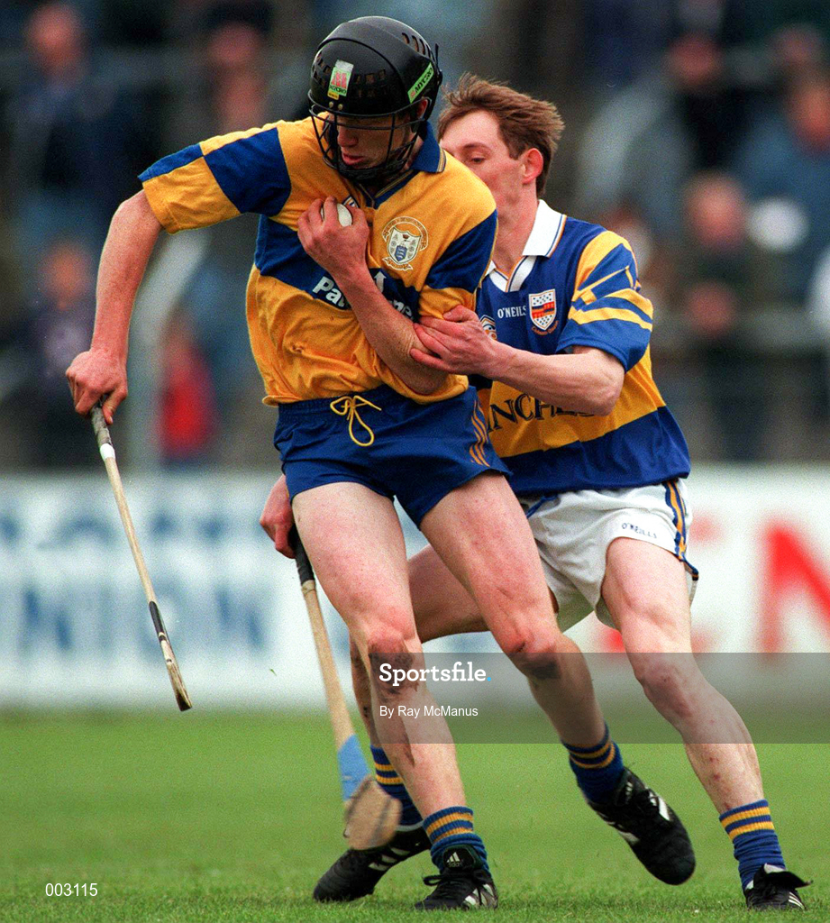 10 May 1997; Niall Gilligan of Clare in action against George Frend of Tipperary during the National Hurling League Division 1 match between Clare and Tipperary at Cusack Park in Ennis. Photo by Ray McManus/Sportsfile