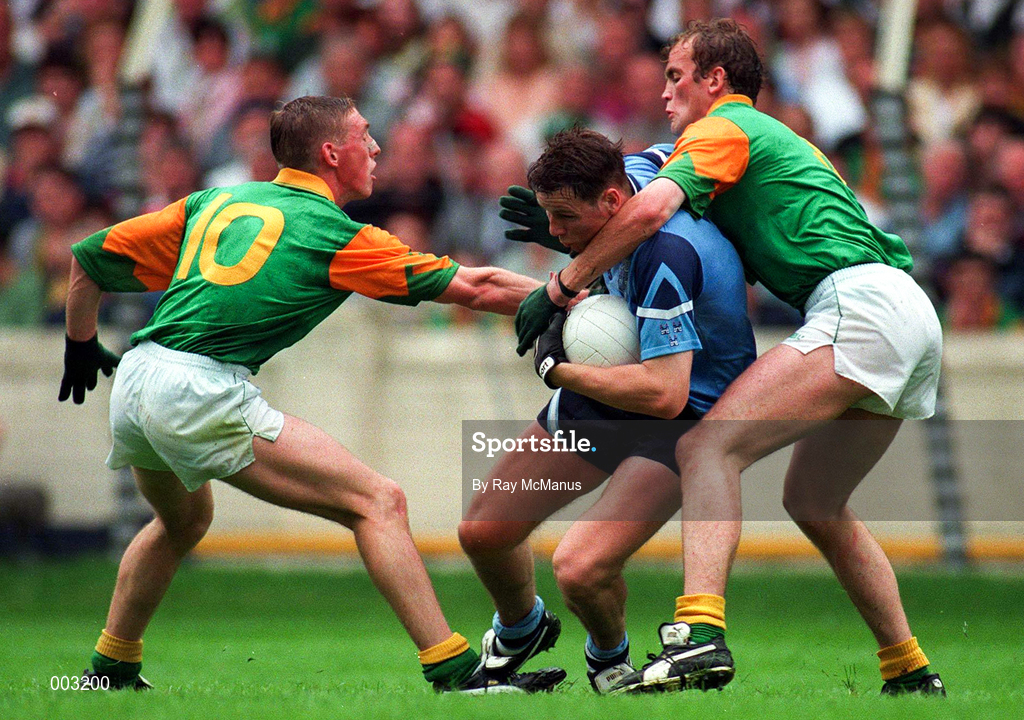 28 July 1996; Paul Curran of Dublin is tackled by Trevor Giles and John McDermott of Meath during the Leinster Senior Football Championship Final between Dublin and Meath in Croke Park, Dublin. Photo by Ray McManus/Sportsfile