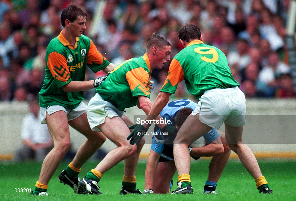 28 July 1996; Paul Curran of Dublin is tackled by the Meath defence during the Leinster Senior Football Championship Final between Dublin and Meath in Croke Park, Dublin. Photo by Ray McManus/Sportsfile
