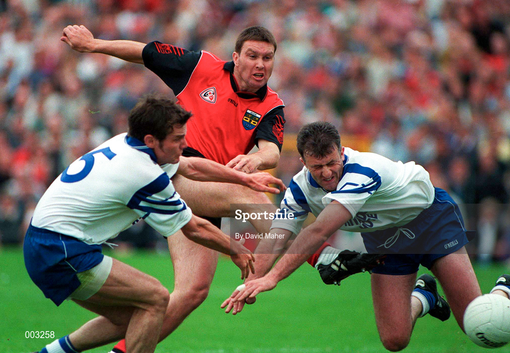 23 June 1996; Peter Withnell of Down has a shot on goal despite the efforts of Dermot Duffy, left, and Gerard McGurk of Monaghan during the  Ulster GAA Senior Football Championship Quarter-Final between Monaghan and Down at St. Tiernach's Park in Clones. Photo by David Maher/Sportsfile