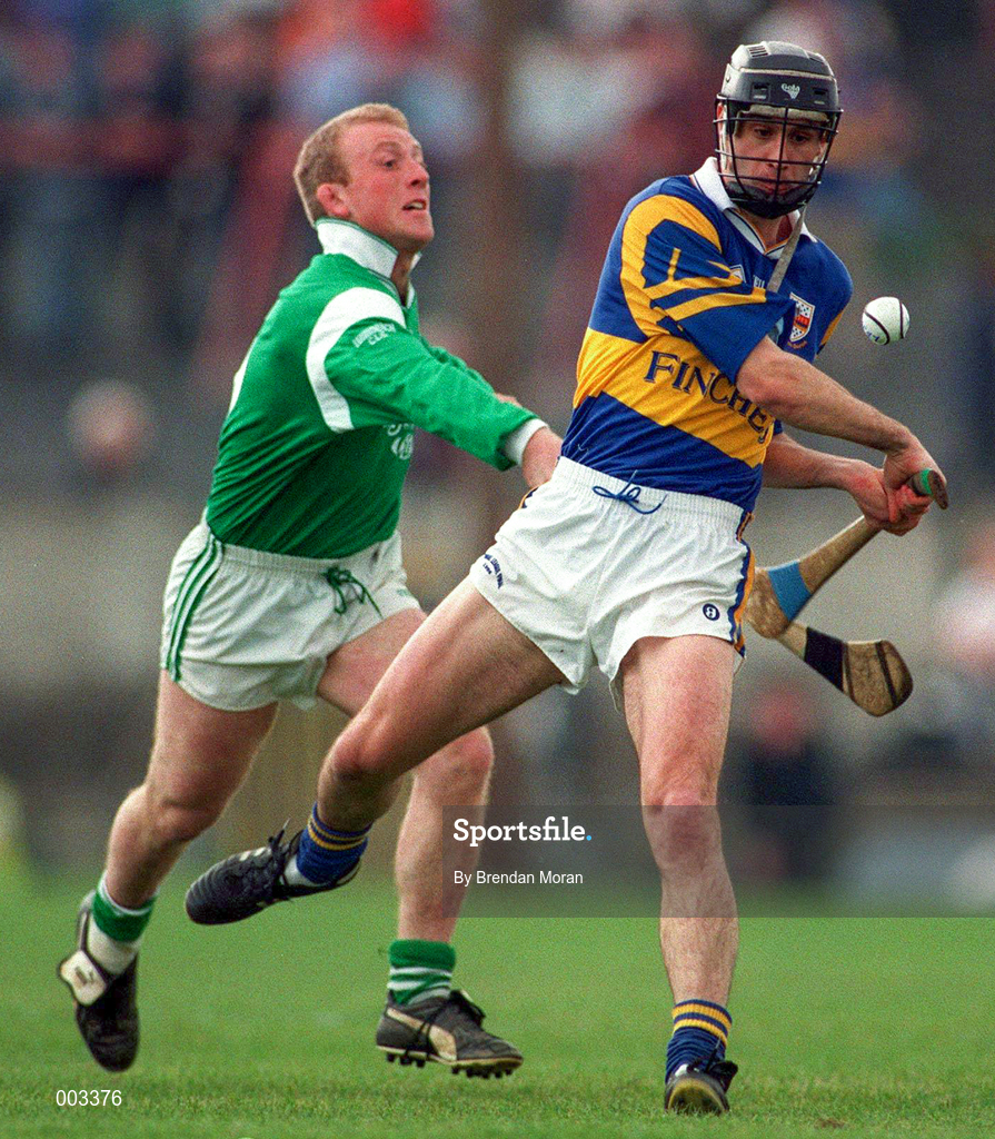13 April 1997; Thomas Dunne of Tipperary in action against Dave Clarke of Limerick during the National Hurling League Division 1 match between Limerick v Tipperary at the Gaelic Grounds in Limerick. Photo by Brendan Moran/Sportsfile